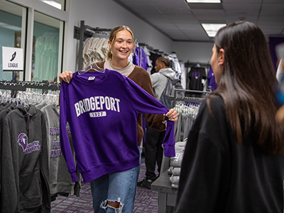 UB students byuing merch