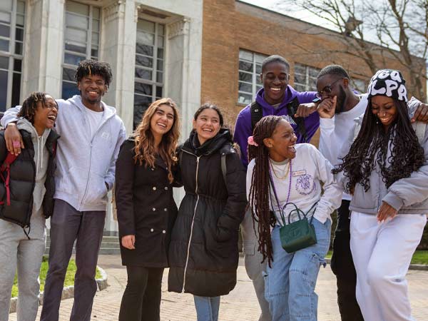 group of high school students laughing