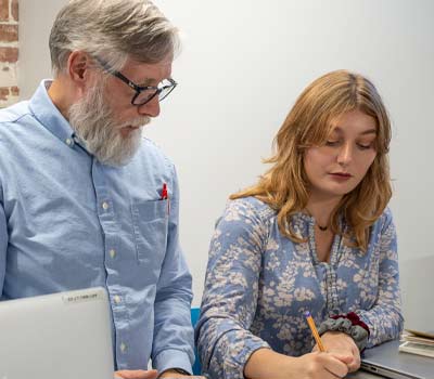2 people working on a project