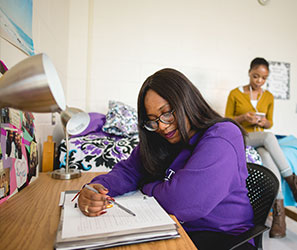 UB students in a dorm