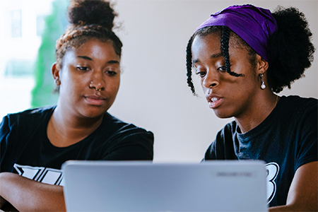 two students discussing the UB transfer application