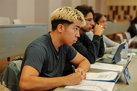 Students in lecture hall being taught