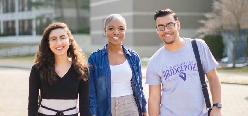 three happy students