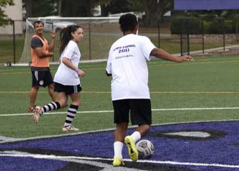 UB alumni playing soccer
