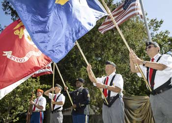 veterans holding flags