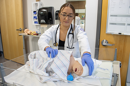 Nursing Student in sim lab