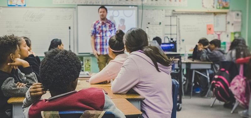 Secondary Education graduate teaching a class