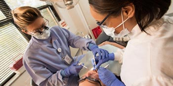 A UB student in the Fones School of Dental Hygiene