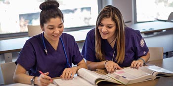 Two UB students earning a BSN degree in CT